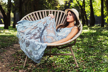 Beauty, chair, pose, brunette, girl, hat HD wallpaper