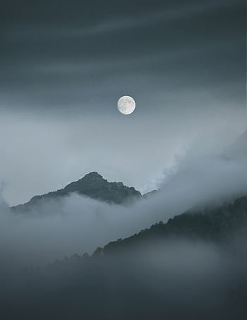 Ethereal view of a full moon over misty mountains in Sochi, Russia HD phone wallpaper