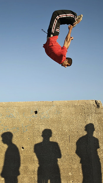 Sports parkour, Athletic discipline, Physical prowess, Mind-bending flips HD phone wallpaper
