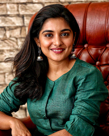 Nivetha Thomas, facial expression, Malayalam actress HD phone wallpaper