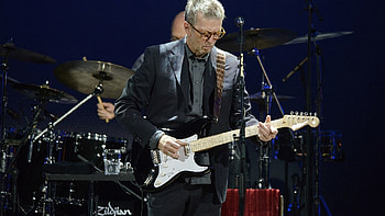 Eric Clapton, Emotional resonance, Captivating performances, Timeless classics HD wallpaper