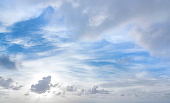 Tranquil blue and white cloudscape above Kapaa with light soft clouds. HD wallpaper