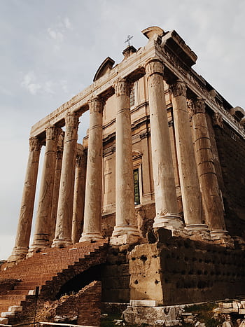 Explore the ancient Roman Forum ruins with iconic columns, capturing historic architecture in Rome, Italy. HD phone wallpaper