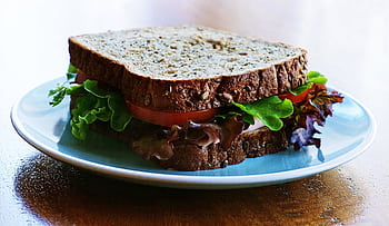 Delicious and nutritious homemade sandwich with whole wheat bread and fresh vegetables. HD wallpaper
