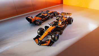 McLaren F1 — Twin Orange Race Cars, F1, McLaren F1, McLaren, Race Car HD wallpaper
