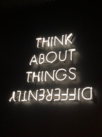 A glowing neon sign displaying an upside-down motivational quote against a dark background. HD phone wallpaper