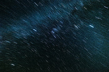 Stunning long exposure of star trails in Jalisco, Mexico's night sky, capturing cosmic motion. HD wallpaper