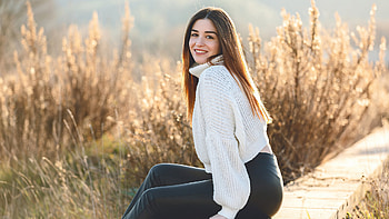 Smiling Blonde Girl Model Is Wearing White Woolen Knitted Top And Blue Jeans Girls HD wallpaper