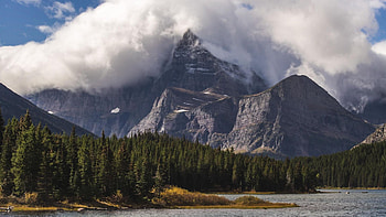 Glacier National Park shot from Swiftcurrent Lake, landscape, trees, clouds, montana, mountains, usa HD wallpaper