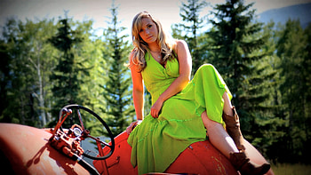 Sitting On Her Tractor.., style, cowgirl, fun, tractors, fashion, outdoors, ranch, blondes, trees, girls, women, models, boots, western, female HD wallpaper