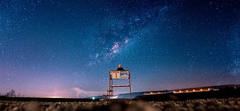 A mesmerizing view of the Milky Way over Kragujevac, Serbia, showcasing a starry night sky. HD wallpaper
