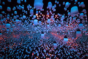 A mesmerizing display of colorful hanging lanterns in a Tokyo art museum. HD wallpaper