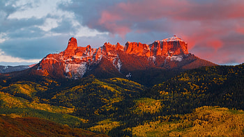 mountains on fire, cliffs, red, mountains, forest, sunset HD wallpaper