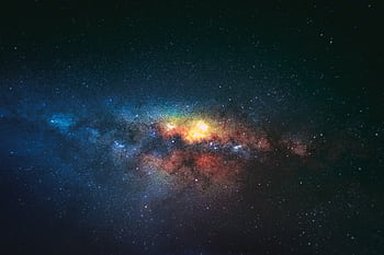 Breathtaking view of the colorful Milky Way galaxy in a starry night sky, showcasing cosmic beauty. HD wallpaper