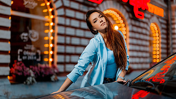 Gulmira Zubanova Girl Model Is Standing Near Car Wearing Light Blue Color Dress In Blur Decoration Lights Background Girls HD wallpaper