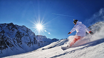 Sunlit snowboarding, Majestic mountains, Snowy paradise, Snowboarding HD wallpaper