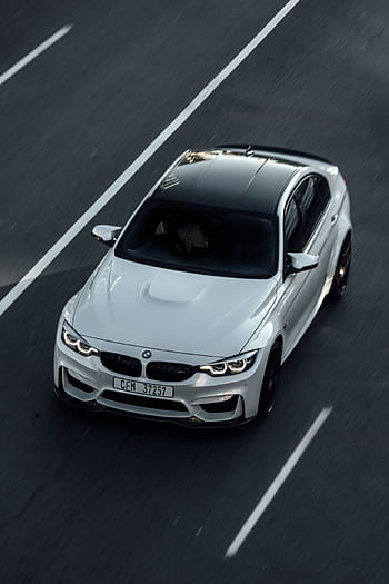 Top-down view of a luxury white car on a clear road in Cape Town. HD phone wallpaper