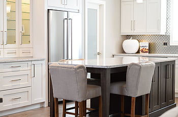 Stylish kitchen interior featuring modern design, island counter and elegant seating. HD wallpaper