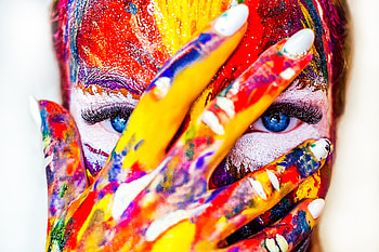 Paint on face and hand, colorful, close up HD wallpaper