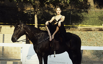 Sharon Stone, Riding a horse, Hollywood beauty, Captivating HD wallpaper