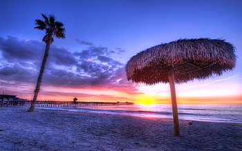 Straw Umbrella By The Beach, colorful, shade, bright, house, sunset, ocean, tree, beach HD wallpaper