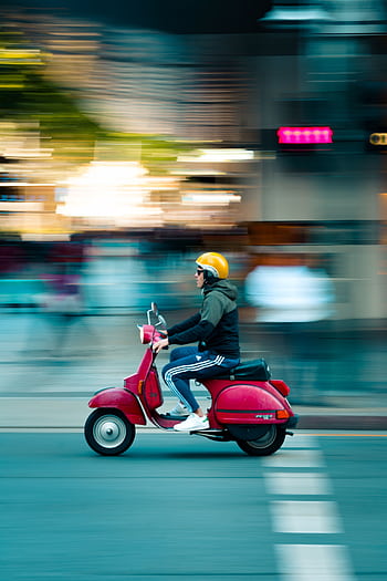 Capturing the vibrant motion of a scooter ride through Brisbane's urban streets. HD phone wallpaper