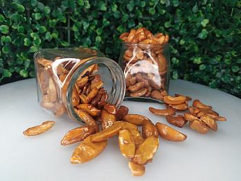 Sweet pili nuts, Philippine delicacy, Gourmet snack, Sweet and savory HD wallpaper
