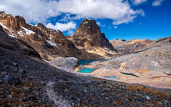 Landscape of the Huayhuash Circuit in Northern Peru, clouds, andes, sky, rocks HD wallpaper