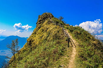 Explore a scenic mountain trail in Thailand with stunning views of the pristine natural landscape. HD wallpaper