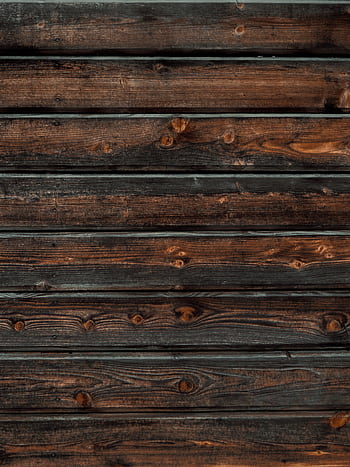 Close-up of a rustic wooden plank wall showing detailed grain and texture for interior design. HD phone wallpaper