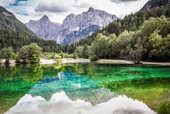 Lake Jasna Near Kranjska, Gora Slovenia, blue, slovenia, mountain, kranjska, lake, reflection, jasna, clouds, trees, nature, sky, water, gora, forest HD wallpaper