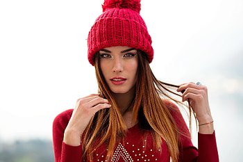 Gorgeous woman, red cap, brown eyes HD wallpaper
