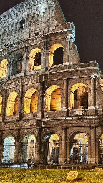 Colosseum grandeur, Rome's famous monument, Architectural marvel, Iconic backdrop HD phone wallpaper