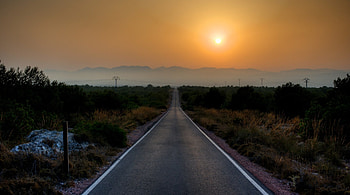 long straight road in santa pola spain, bushes, road, mountains, sunset HD wallpaper