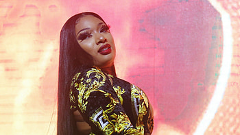 Megan Thee Stallion, Vibrant energy, Captivating stage presence, Hip-hop sensation HD wallpaper