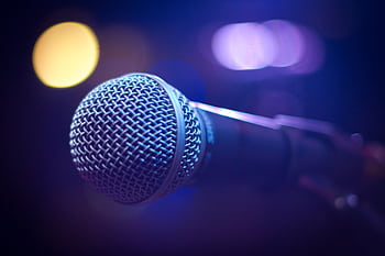 An artistic close-up of a micro with blurred bokeh lighting, perfect for music themes. HD wallpaper