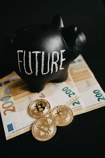 Black piggy bank labeled 'Future' with 200 euro bills and Bitcoin coins, symbolizing modern savings. HD phone wallpaper