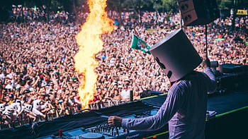 Marshmello's performance, Musical festival energy, Captivating visuals, Unparalleled showmanship HD wallpaper