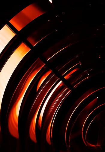 Vibrant abstract featuring glowing red spirals and curves forming a dynamic pattern. HD phone wallpaper