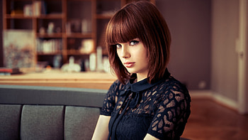 Beautiful Blonde Short Hair Girl Model Is Sitting On Couch Wearing Black Dress Girls HD wallpaper