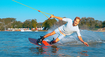 Beach wakeboarding, Greek coastline, Water sport thrill, Exhilarating waves HD wallpaper