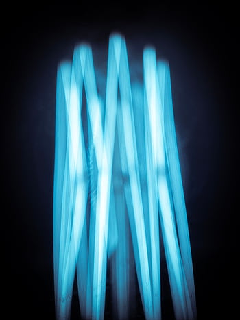 Vibrant abstract featuring blue neon light streaks creating a modern, illuminated pattern. HD phone wallpaper