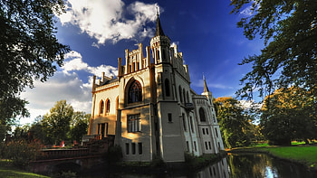 beautiful restored castle, clouds, trees, bridge, castle, pond HD wallpaper
