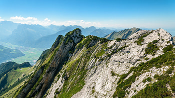 Landscape View Of Greenery Rock Mountains Slope Under Blue Sky During Daytime Nature HD wallpaper