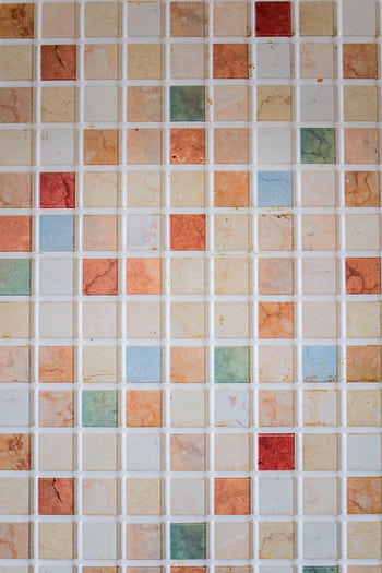A vibrant mosaic tile wall with multicolored geometric patterns. HD phone wallpaper