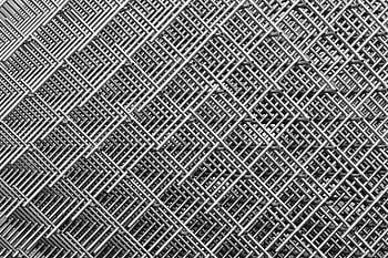 Abstract close-up of interwoven metal grids creating a symmetrical, textured pattern in monochrome. HD wallpaper