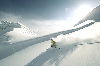 Skiing, Fast downhill rush, Alpine snow adventure, Luxury hotel stay HD wallpaper