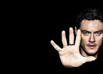 Luke Evans, black, actor, face, hand HD wallpaper