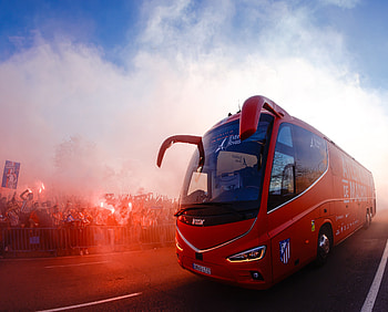 Red Ride: Atlético Madrid Team Bus — Fan, Vehicle, Crowd HD wallpaper