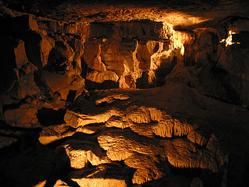 Inside a Cave, light spots, darkness, cave, flowstone HD wallpaper